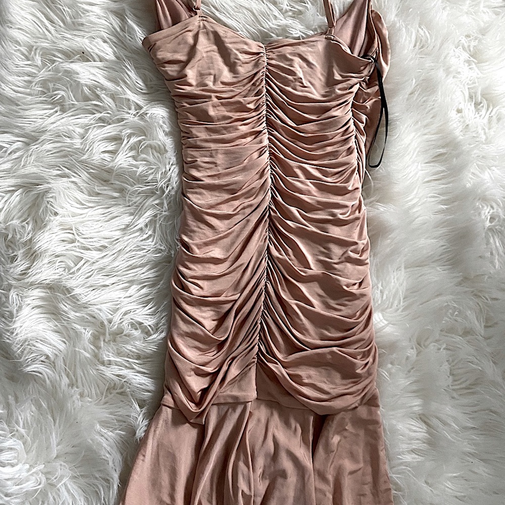 It’s like a nude color a bodycon dress